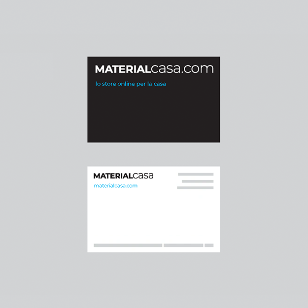 A business card with the MaterialCasa logo displayed prominently on the front and back